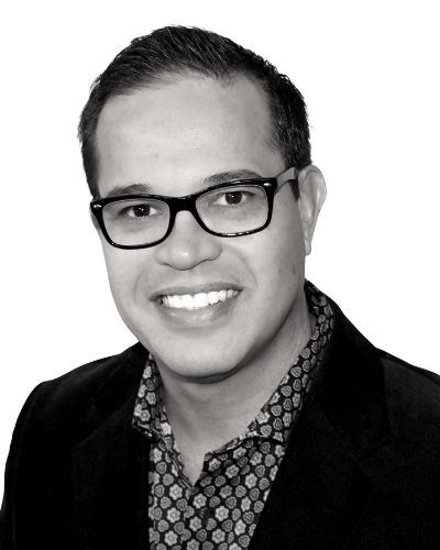 Alt="Closup of Omark Pagan, South Florida Realtor."